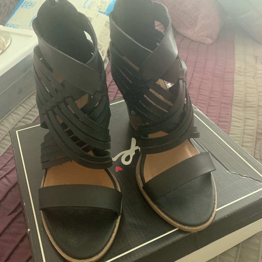 Zip up black shoes